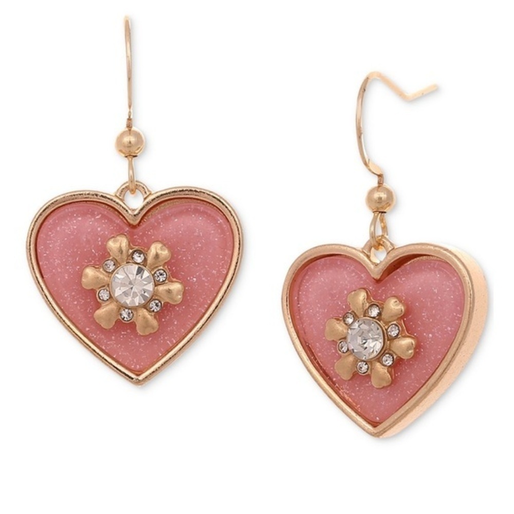 Centered in sparkling hearts, glistening crystals